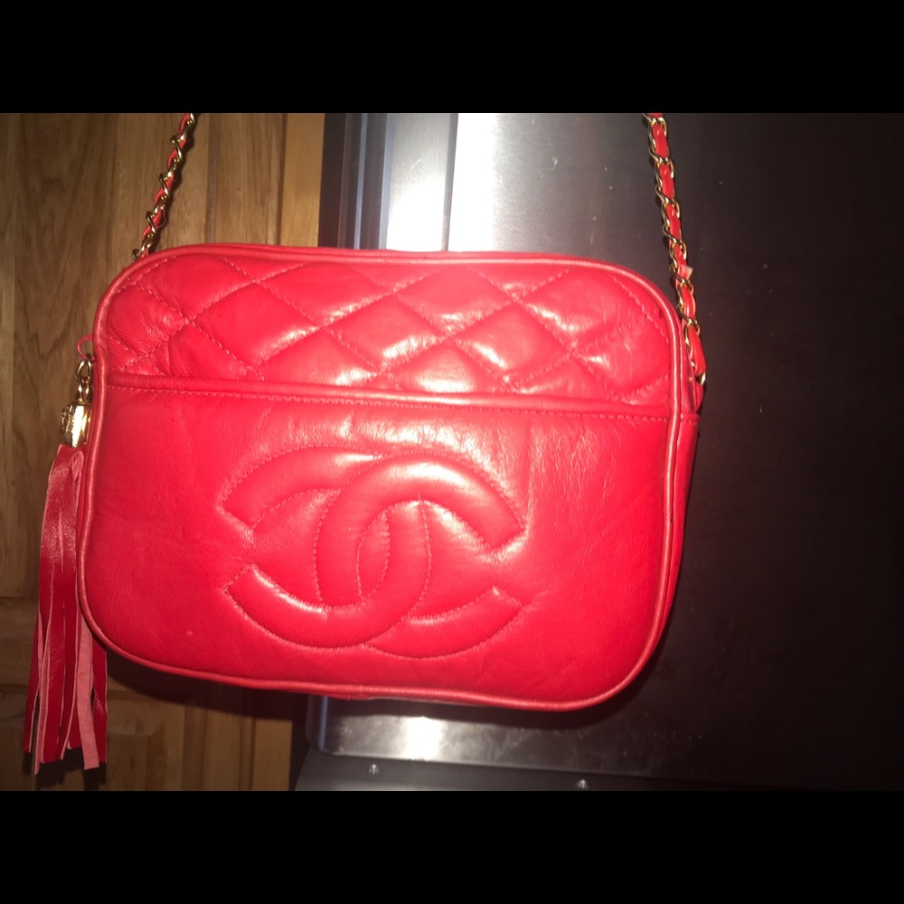 Red Chanel logo chain link purse.